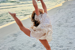 girls-dancing-on-beach
